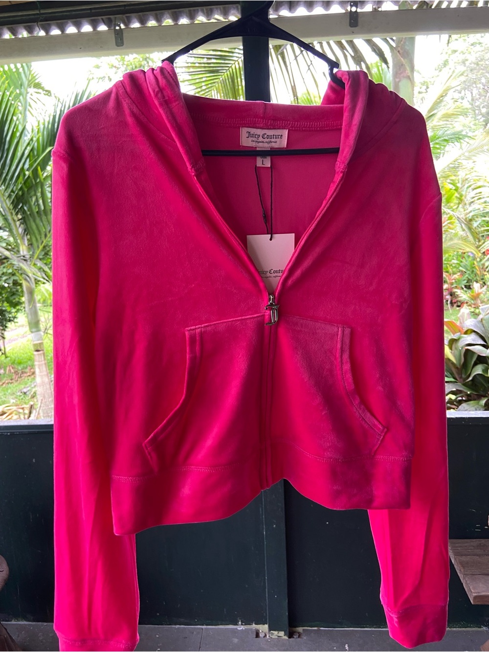 Velvet Pink Juicy Couture Zip hoodie with word Juicy on back.